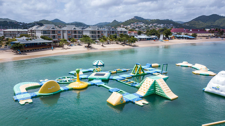 At Splash Island, families can enjoy a floating bounce house.